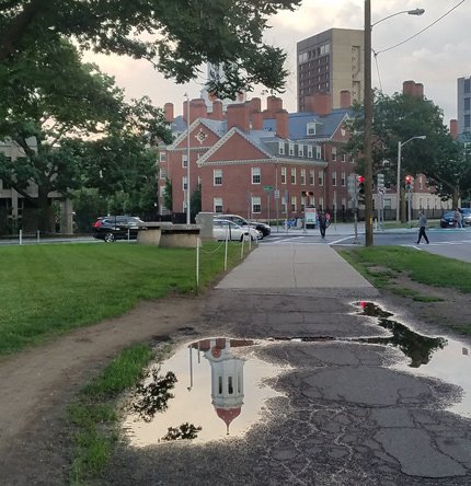 Cupola in a puddle in Cambridge