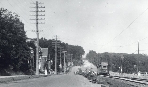 Workers extending a trolley line in old Boston