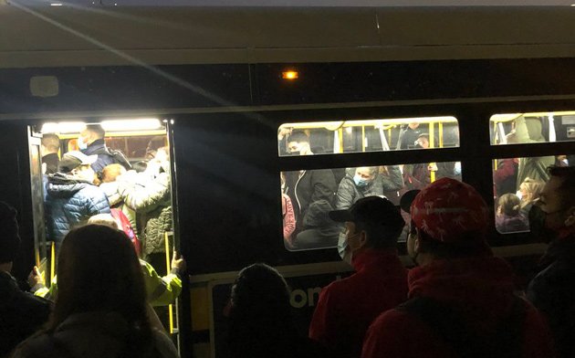 Crowded Blue Line shuttle bus