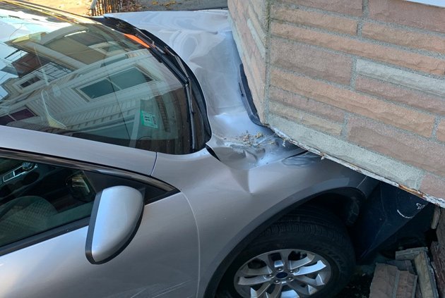 Car into London Street house, with parking ticket