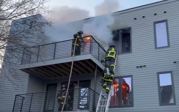 Firefighters at 1644 Dorchester Ave. fire