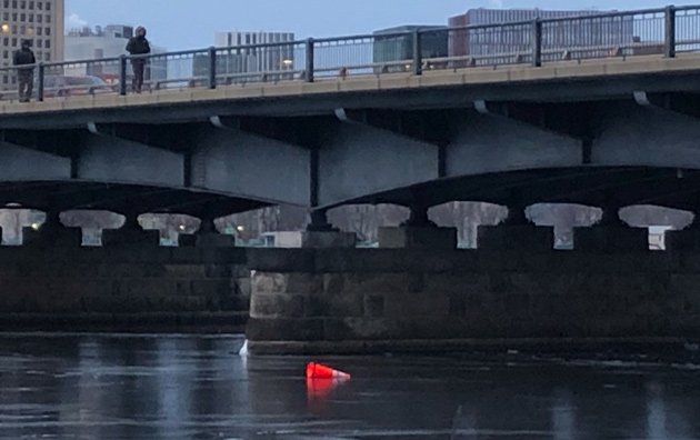 Cone atop the Charles River off the Mass. Ave. bridge