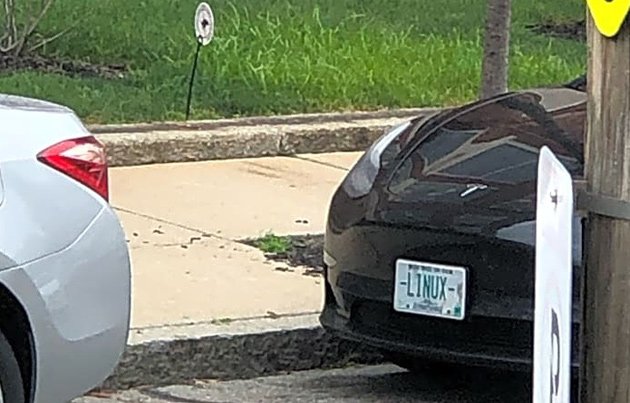 Car with New Hampshire plates parking in resident-only spot on Horace Street