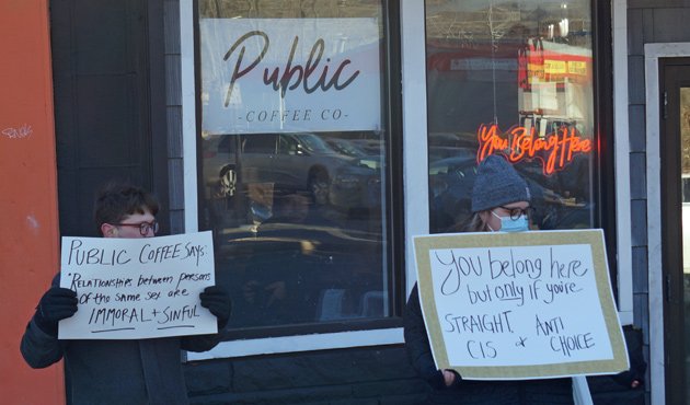 Protesters outside the new Public Coffee Co. on Hyde Park Avenue, who say the place is transphobic and homophobic