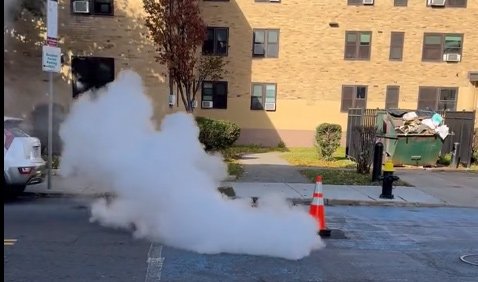 Steam spouting manhole on Harrison Avenue