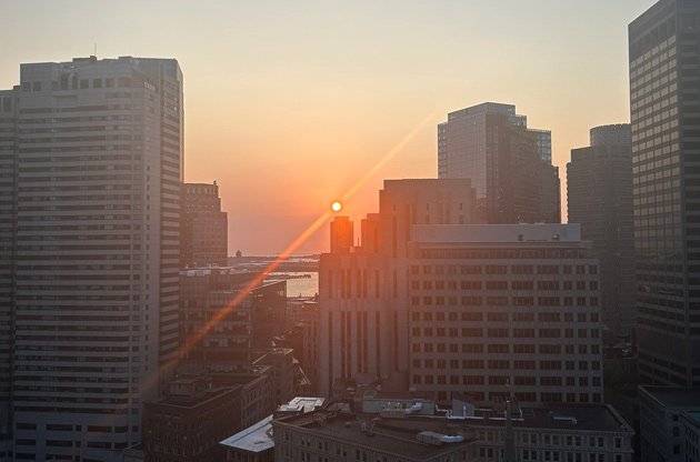Sun rises over downtown Boston