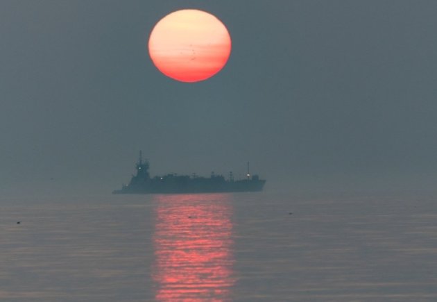Hazy sunrise over the water off Winthrop