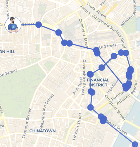 A map of Boston. A blue line meanders and loops across the map, approximating a random walk.  It goes on tiny streets, loops around, and seems to seek out busy intersections intentionally.