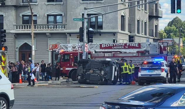 Flipped SUV at Commonwealth and Harvard avenues