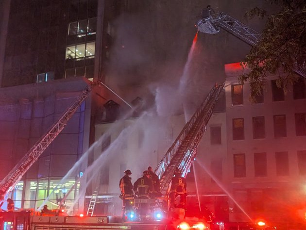 Firefighters attack Jacob Wirth fire from ladders