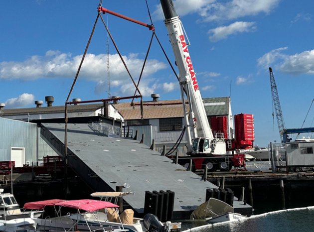 Slipped dock, damaged boat