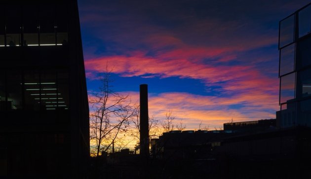 Vivid blue and orange sunset over MIT