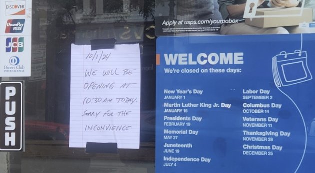 Sign on door of North End post office: Not open