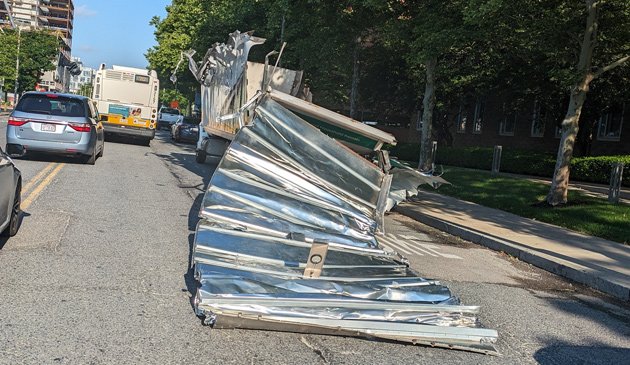 The remains of a truck shredded by a bridge on Soldiers Field Road