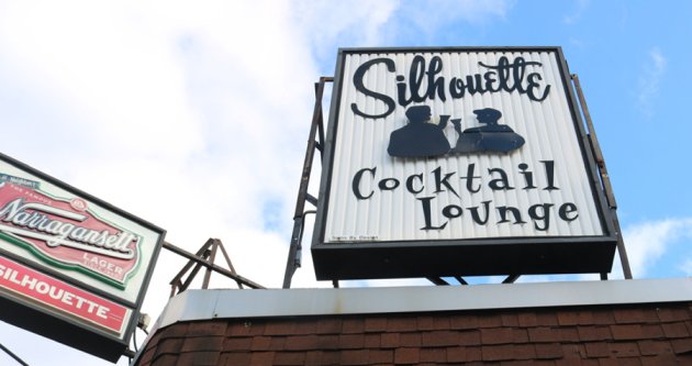 Silhouette Lounge sign in better days