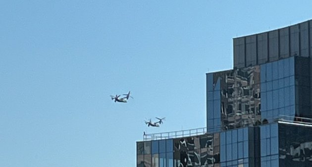 Two Osprey helicopters