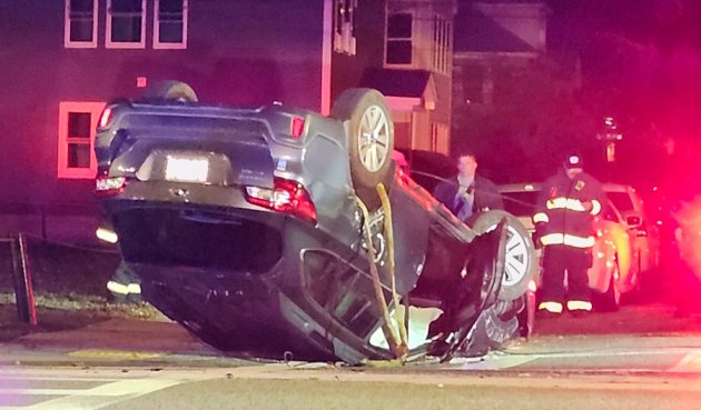 Overturned car at Washington Street and Wellesmere Road