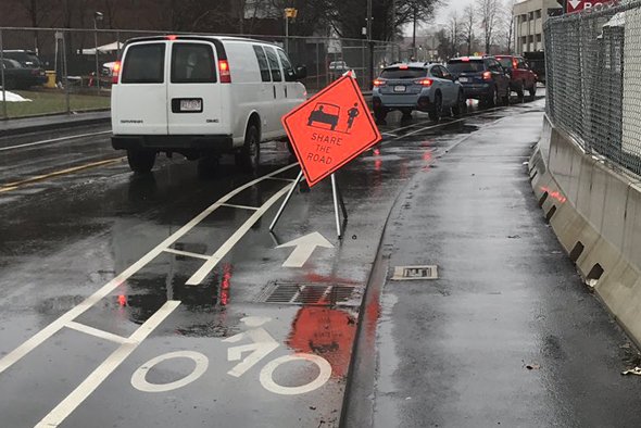 Share the Road sign in the bike lane