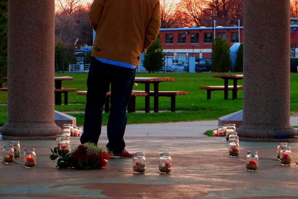 Man waits for girlfriend at Carson Beach in South Boston