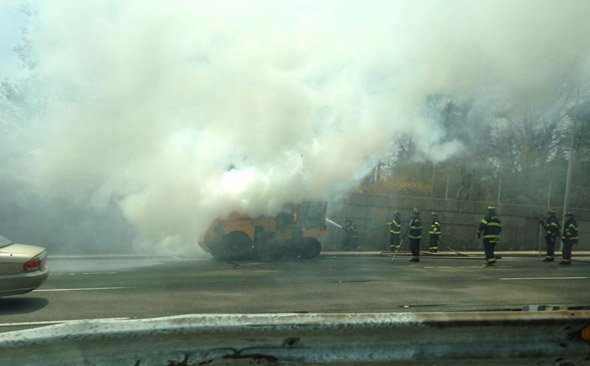 Street sweeper on fire in Belmont