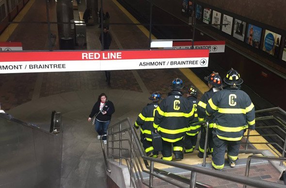 Firefighters going down to Alewife station