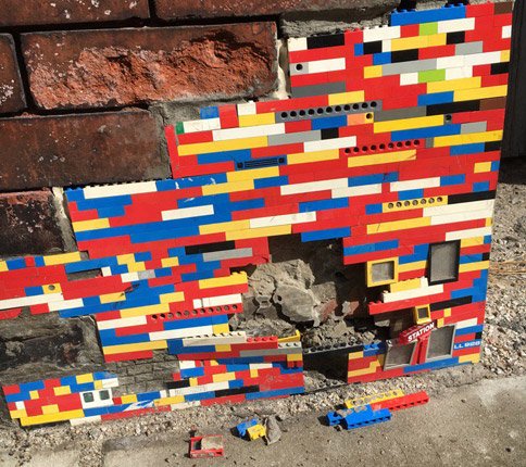 Damaged Lego wall in South Boston