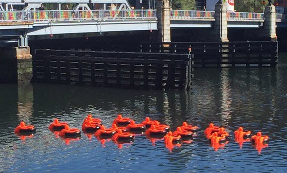 Orange people in Fort Point Channel