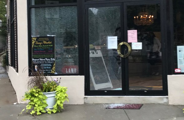 Smashed glass at Tony's meat market in Roslindale