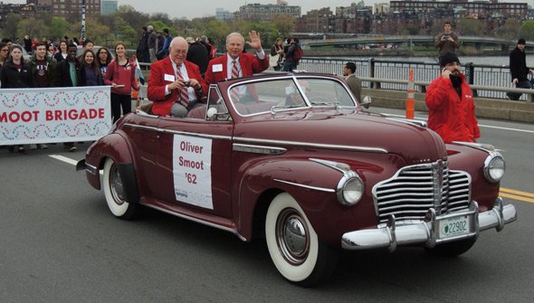 Oliver Smoot in parade on the Massachusetts Avenue bridge