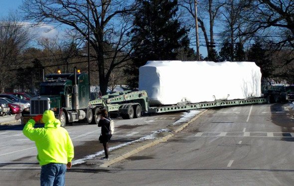 Updated trolley being delivered to Green Line at Riverside