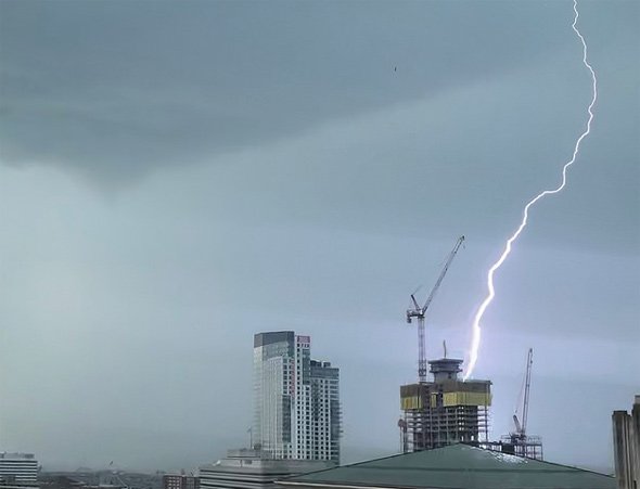 Lightning hits a building under construction in Boston