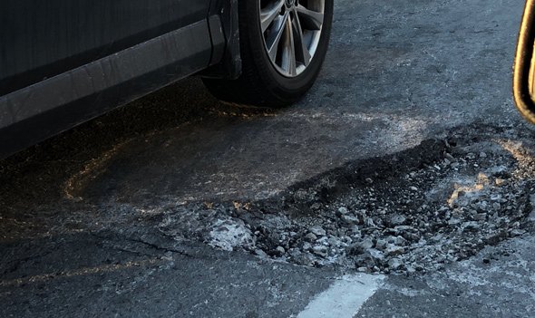 Pothole at the Jamaicaway and Perkins Street in Jamaica Plain