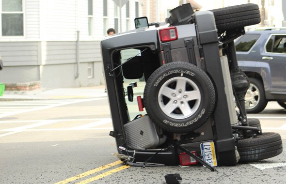 Flipped SUV at L and East 6th streets in South Boston