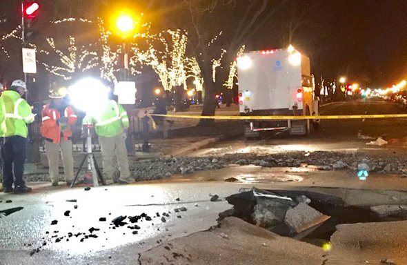 Buckled pavement after water-main break in the Back Bay