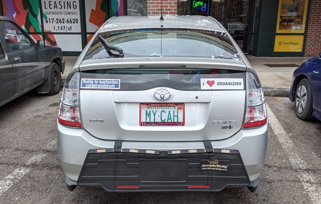 Car with a license plate that reads MY CAH