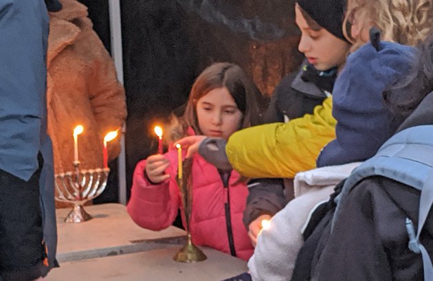 Menorah lighting in Adams Park in Roslindale Square