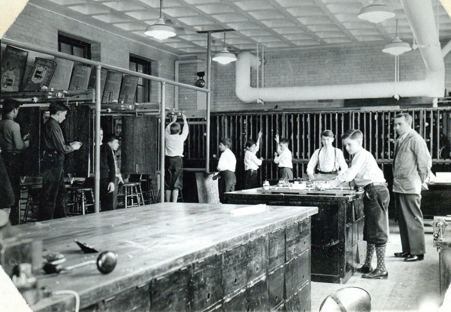 Boys in knickers in old Boston shop class