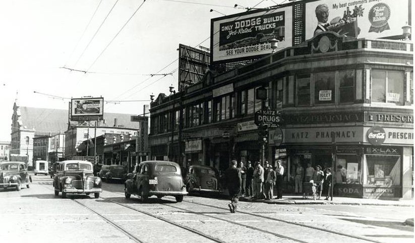 Street scene in old Boston, featuring trolley tracks and Katz Pharmacy