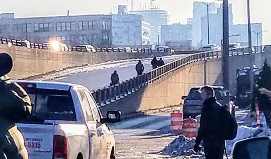 Frustrated bus riders give up and walk onto McGrath Highway to get to Lechmere