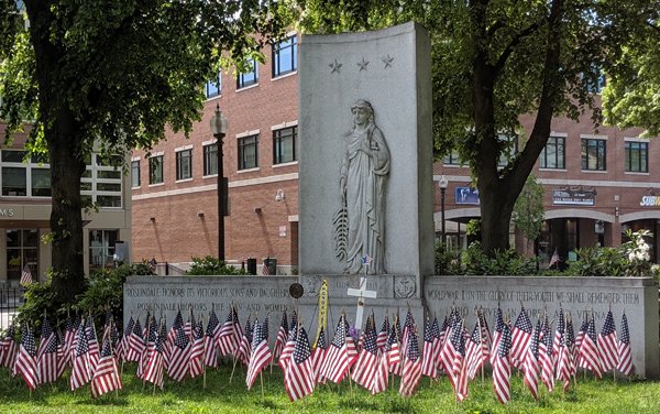 Flags at Korean and Vietnam War memorial in Adams Park, Roslindale