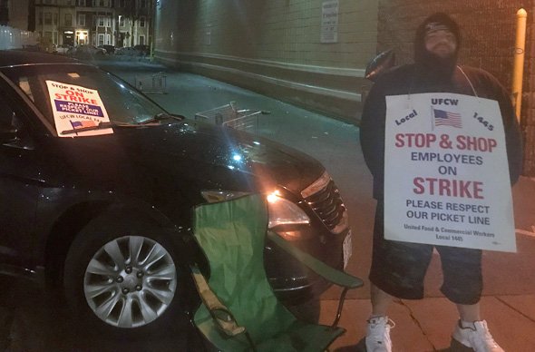 A single Stop & Shop picketer at 11:50 p.m. in South Boston