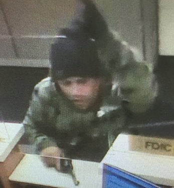 Wanted for Somerville bank robbery, shooting at officer