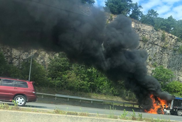 Truck on fire on I-93