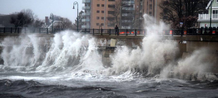 Waves slam into Lynn seawall