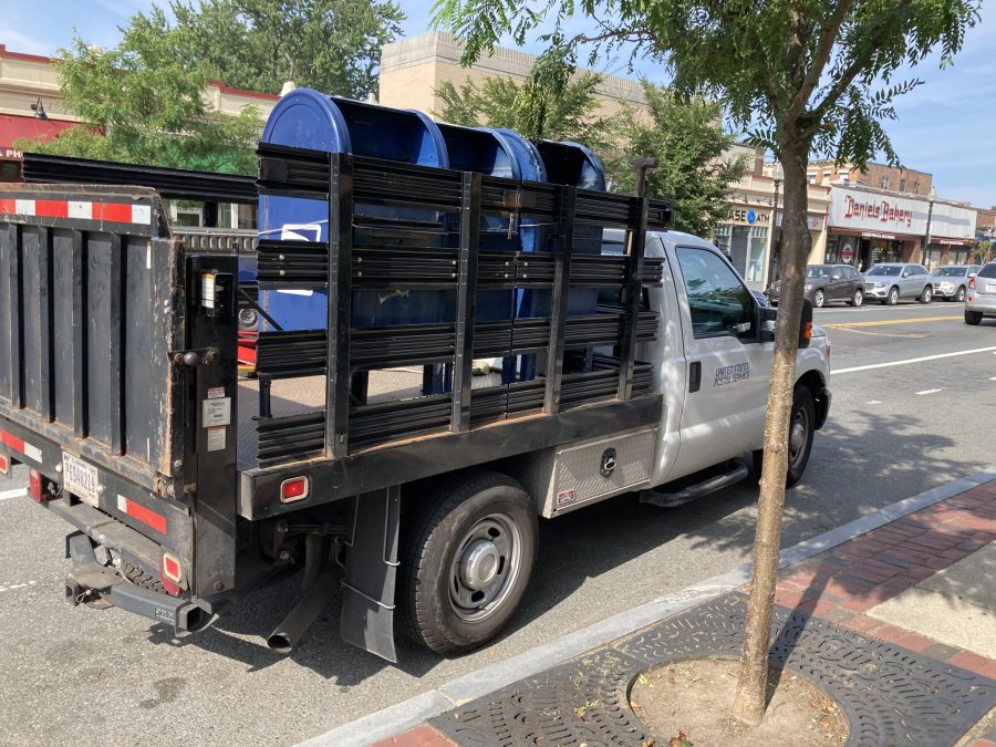 Mailboxes being taken away on Washington Street in Brighton