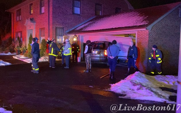 Car into garage in West Roxbury