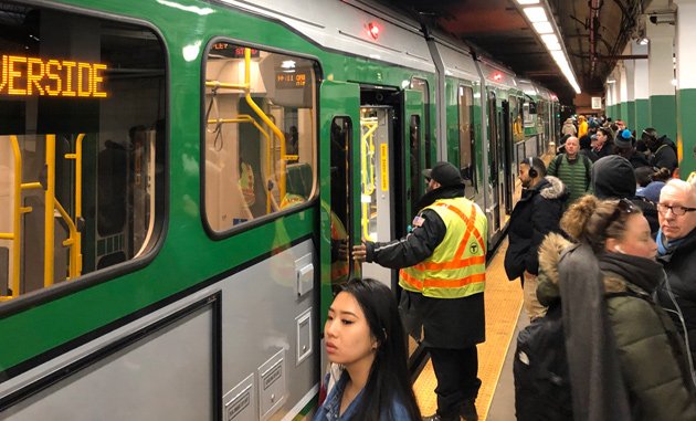 Broken door on a new Green Line trolley at Copley