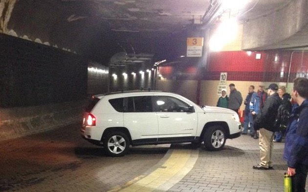 Car in Harvard Square busway