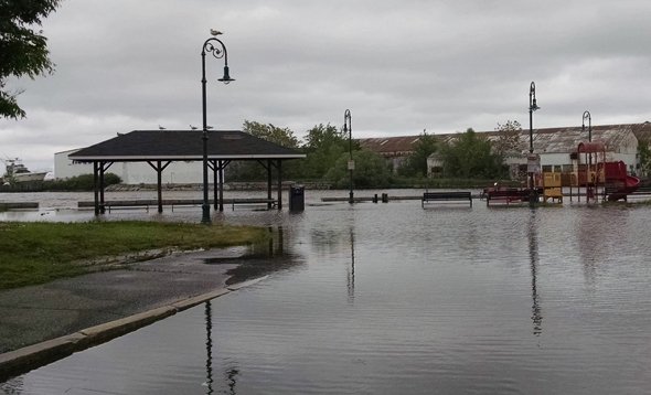 Flooded playground at Tenean Beach in Dorchester