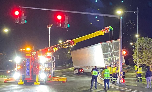 Big crane lifts big truck